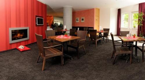 gedeelde lounge/tv-ruimte, Euro Park Hotel Hennef in Hennef gedeelde lounge/tv-ruimte, Euro Park Hotel Hennef in Hennef