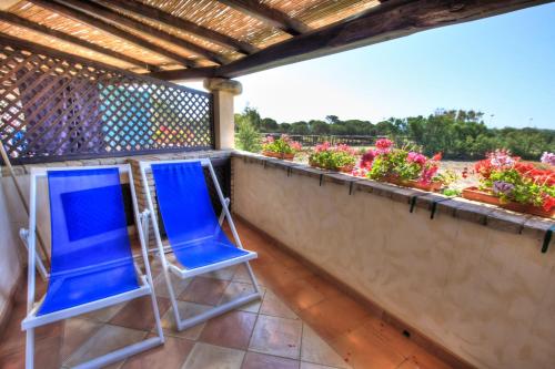 balkon/terras, Porto Giunco Residence in Notteri balkon/terras, Porto Giunco Residence in Notteri