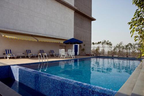 Swimming pool, Lemon Tree Hotel East Delhi Mall in Ghaziabad Swimming pool, Lemon Tree Hotel East Delhi Mall in Ghaziabad