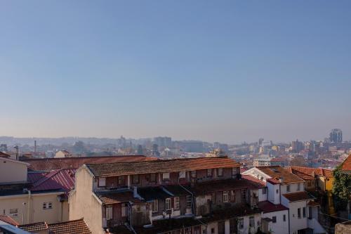 This photo about Liiiving in Porto | Mezzanine Downtown Balcony shared on HyHotel.com