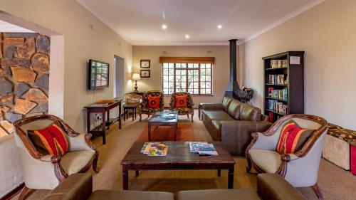 Shared lounge/TV area, Misty Mountain in Sabie Shared lounge/TV area, Misty Mountain in Sabie