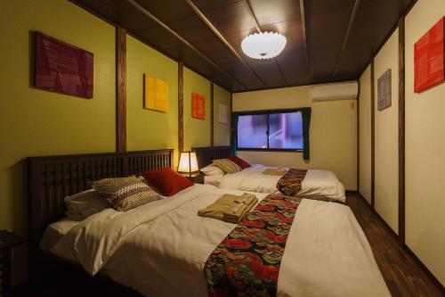 This photo about IKIDANE HOUSE Osaka Kyobashi NEI shared on HyHotel.com