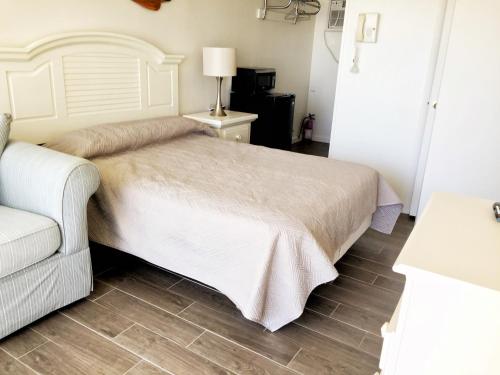 在meiguo.com看到的Four Winds Condo Motel的介绍图片