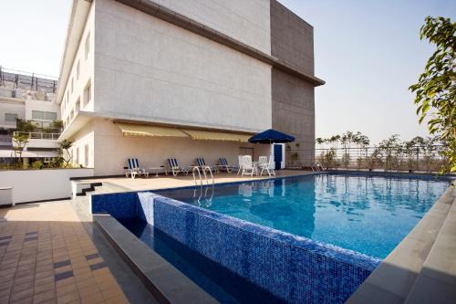 Swimming pool, Lemon Tree Hotel East Delhi Mall in Ghaziabad Swimming pool, Lemon Tree Hotel East Delhi Mall in Ghaziabad