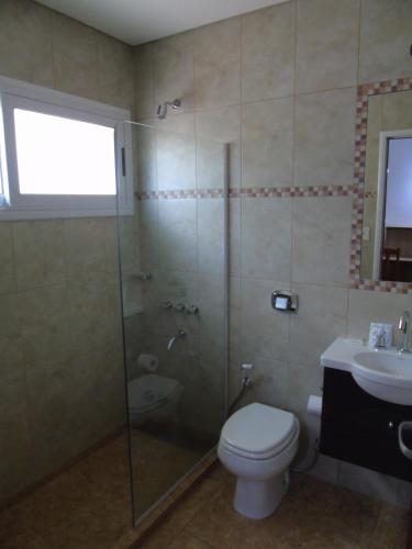 Badkamer, Urunday Apart Hotel in Posadas Badkamer, Urunday Apart Hotel in Posadas