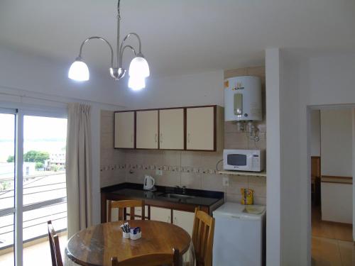 廚房, 蘆荻公寓酒店 (Urunday Apart Hotel) in 波薩達斯 廚房, 蘆荻公寓酒店 (Urunday Apart Hotel) in 波薩達斯