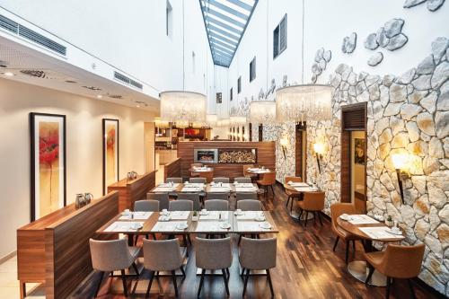 Restaurante, H4 Hotel Munster in Munster City Center Restaurante, H4 Hotel Munster in Munster City Center