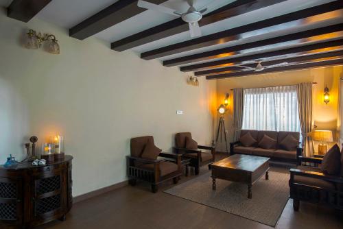 gedeelde lounge/tv-ruimte, Alencherry plantation homestay in Periyar gedeelde lounge/tv-ruimte, Alencherry plantation homestay in Periyar