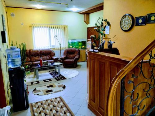 gedeelde lounge/tv-ruimte, Venesis House in Sighisoara gedeelde lounge/tv-ruimte, Venesis House in Sighisoara