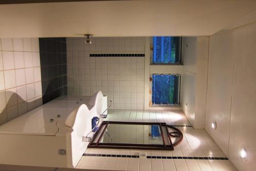 Salle de bain, Raina Beach Apartments & Houses in Rarotonga Salle de bain, Raina Beach Apartments & Houses in Rarotonga