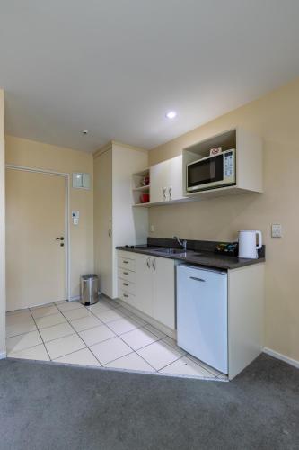 مطبخ, Abbella Lodge Motel in بابانيو مطبخ, Abbella Lodge Motel in بابانيو