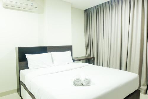 New Homey 2BR Brooklyn Alam Sutera Apartment By Travelio