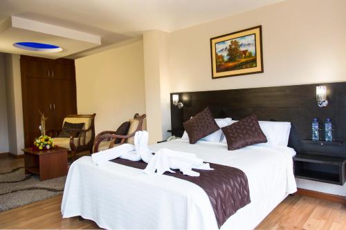 Letto, Hotel Versailles in Ambato Letto, Hotel Versailles in Ambato