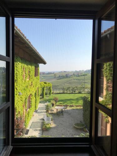 Uitzicht, Cascina Delle Rose in Treiso Uitzicht, Cascina Delle Rose in Treiso