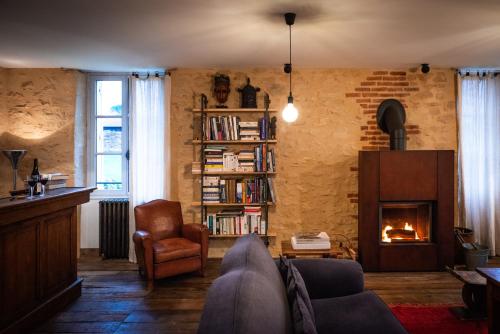 Общ салон/телевизионна зона, Les Hauts de Saint Vincent B&B proche Sarlat in Свети-Винсан-дьо-Кос Общ салон/телевизионна зона, Les Hauts de Saint Vincent B&B proche Sarlat in Свети-Винсан-дьо-Кос