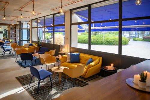 Паб/Коктейль-бар, Tulip Inn Antwerpen in Антверпен Паб/Коктейль-бар, Tulip Inn Antwerpen in Антверпен