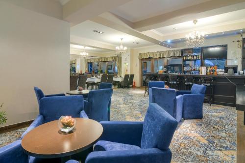 Közös társalgó / TV, Rizzo Boutique Hotel in Poiana Brasov Közös társalgó / TV, Rizzo Boutique Hotel in Poiana Brasov