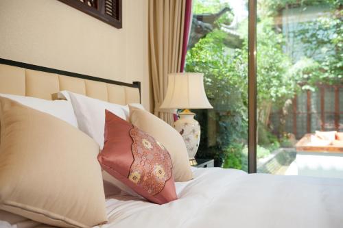 This photo about Floral Hotel · The Peony Pavilion Lijiang shared on HyHotel.com