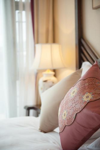 This photo about Floral Hotel · The Peony Pavilion Lijiang shared on HyHotel.com