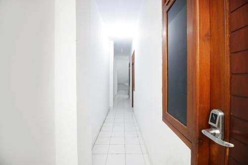 This photo about Airy Eco Syariah Pasar Kemis Raya Ruko Kutajaya Tangerang shared on HyHotel.com