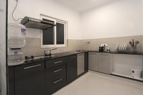 Kitchen, Livi Suites near Indian Space Research Organisation Kitchen, Livi Suites near Indian Space Research Organisation
