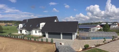 Exterior view, Landhaus Ferienwohnungen mit Pool und Wellness in Neukirchen-Balbini Exterior view, Landhaus Ferienwohnungen mit Pool und Wellness in Neukirchen-Balbini