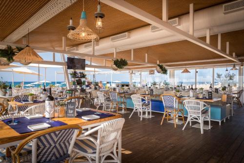 مطعم, فندق إتش توب أولمبيك (Hotel H TOP Olympic) in كوستا برافا ي ماريسمى مطعم, فندق إتش توب أولمبيك (Hotel H TOP Olympic) in كوستا برافا ي ماريسمى