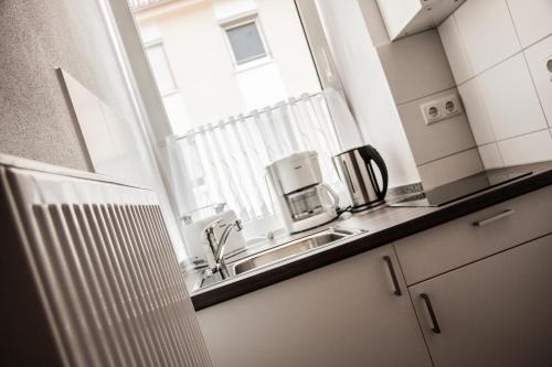 Cocina, Aparthotel - Stadtvilla Premium in Schweinfurt City Center Cocina, Aparthotel - Stadtvilla Premium in Schweinfurt City Center