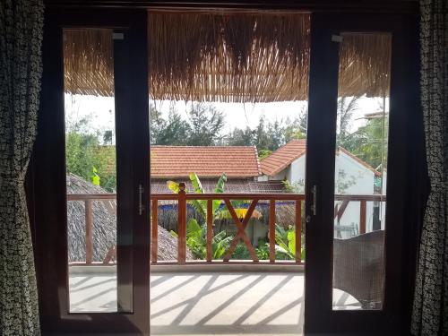Balcony/terrace, The Seaside Bungalow in Dien Duong Balcony/terrace, The Seaside Bungalow in Dien Duong