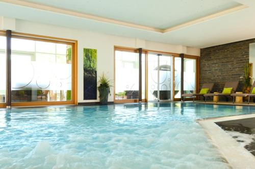 Uszoda, Aktiv- und Wellnesshotel Gutjahr in Abtenau Uszoda, Aktiv- und Wellnesshotel Gutjahr in Abtenau