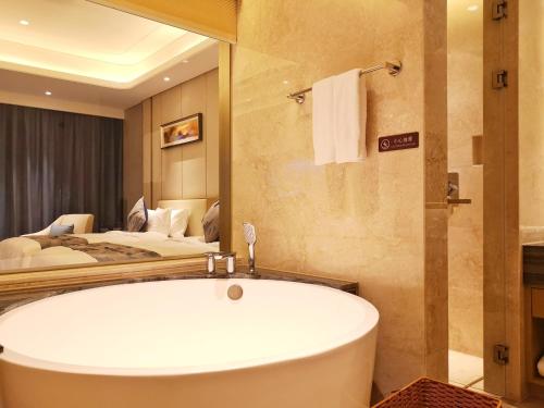 This photo about Ramada Plaza by Wyndham Dongxing City Center shared on HyHotel.com