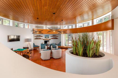 Спільний лаунж/ТБ зона, Apartamentos Turisticos Pinhal Da Marina in Куартейра Спільний лаунж/ТБ зона, Apartamentos Turisticos Pinhal Da Marina in Куартейра