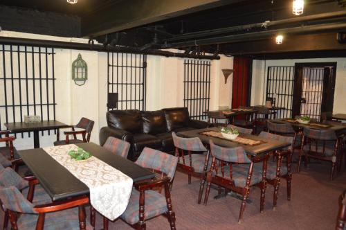 Közös társalgó / TV, The King George Inn in Cobourg (ON) Közös társalgó / TV, The King George Inn in Cobourg (ON)