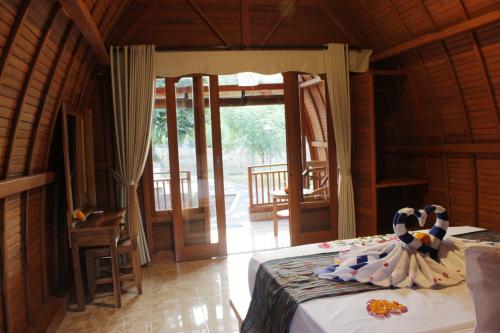 Kubu Padi Wooden House in Pemuteran Kubu Padi Wooden House in Pemuteran