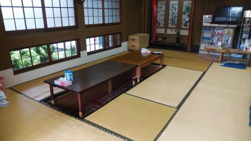 Shared lounge/TV area, Walking Pilgrimage Hotel Tokiwa Ryokan in Ozu Shared lounge/TV area, Walking Pilgrimage Hotel Tokiwa Ryokan in Ozu