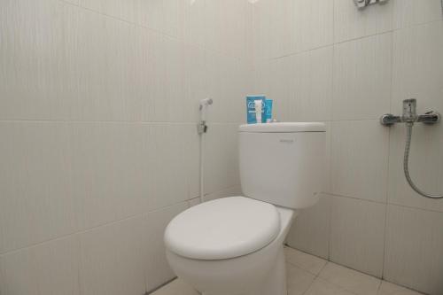 This photo about Airy Syariah Sadang Serang Titiran 26 Bandung shared on HyHotel.com