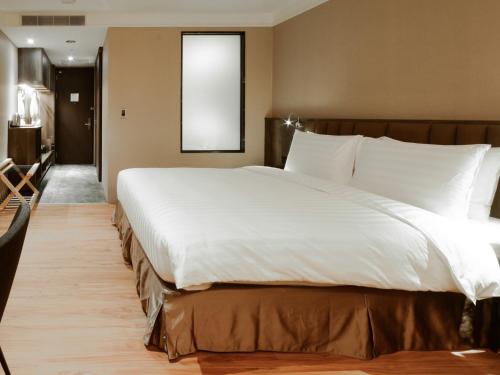 Guestroom, LAI HOTEL in Guiren District Guestroom, LAI HOTEL in Guiren District