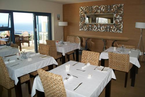 ห้องอาหาร, แมคเจลแลนส์ โฮเต็ล (Magellans Hotel) near หาดโบเดอเรส ห้องอาหาร, แมคเจลแลนส์ โฮเต็ล (Magellans Hotel) near หาดโบเดอเรส