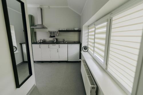 廚房, Jaunāmuiža Apartamenti (Jaunamuiza Apartamenti) in 瓦爾米耶拉 廚房, Jaunāmuiža Apartamenti (Jaunamuiza Apartamenti) in 瓦爾米耶拉