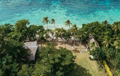 tuin, Whispering Palms - Absolute Beachfront Villas in Efate tuin, Whispering Palms - Absolute Beachfront Villas in Efate