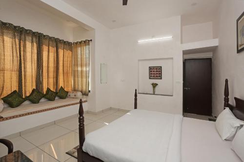 This photo about Elite Farm Stay in Goverdhan Sagar, Udaipur shared on HyHotel.com