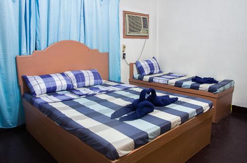 Bed, RedDoorz @ Calceta Street Cogon in Bohol Bed, RedDoorz @ Calceta Street Cogon in Bohol