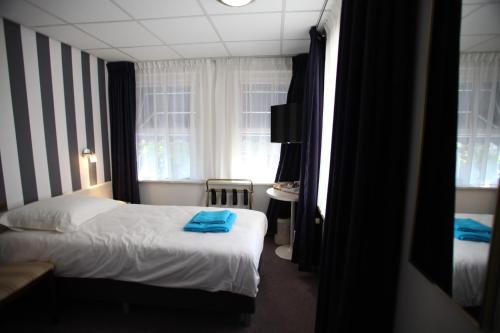 This photo about Het Wapen van Enkhuizen shared on HyHotel.com