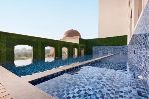 Swimming pool, Ramada Plaza by Wyndham Lucknow in Katibagiya Swimming pool, Ramada Plaza by Wyndham Lucknow in Katibagiya