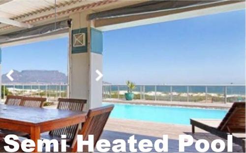 This photo about Blouberg Beachfront Accommodation shared on HyHotel.com