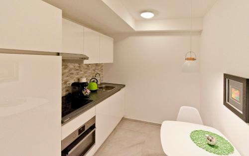 Konyha, Eco Smart Apartments Nürnberg Süd (Eco Smart Apartments Nurnberg Sud) in Nürnberg Konyha, Eco Smart Apartments Nürnberg Süd (Eco Smart Apartments Nurnberg Sud) in Nürnberg