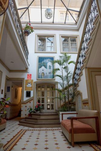 Vestíbulo, Hotel La Orquidea in Cuenca Vestíbulo, Hotel La Orquidea in Cuenca