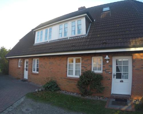 Ferienwohnungen und Haushalfte Friesland in Midlum Ferienwohnungen und Haushalfte Friesland in Midlum