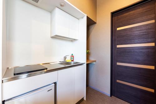 This photo about UCHI Living Stay HACHIKEN Station shared on HyHotel.com