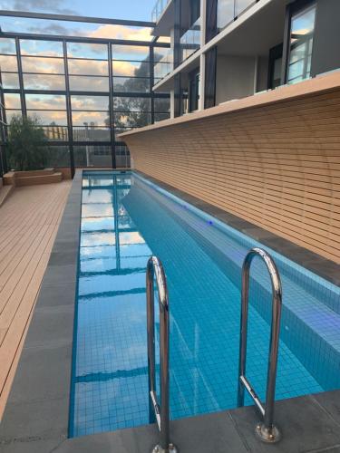 Swimming pool, Nest Apartment Doncaster in Doncaster Swimming pool, Nest Apartment Doncaster in Doncaster